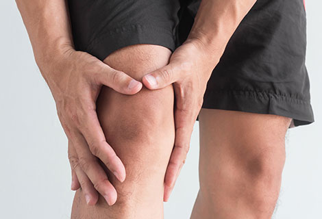 Patient suffering with knee pain following an auto accident